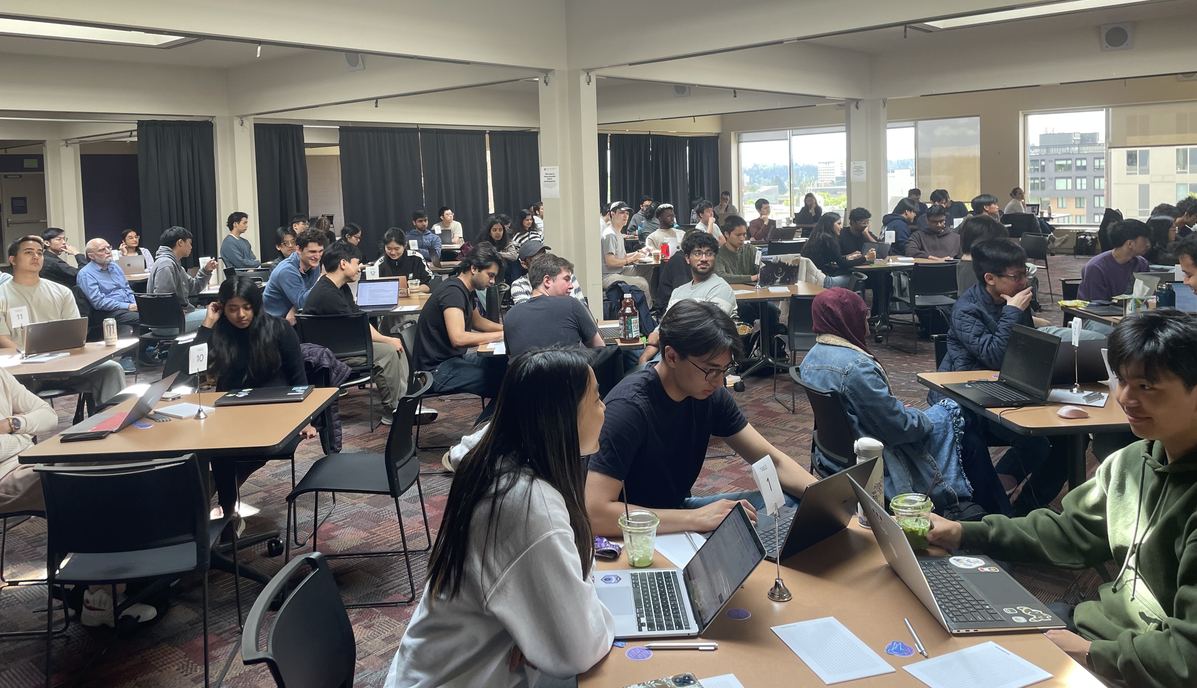Participants working on quantum challenges.